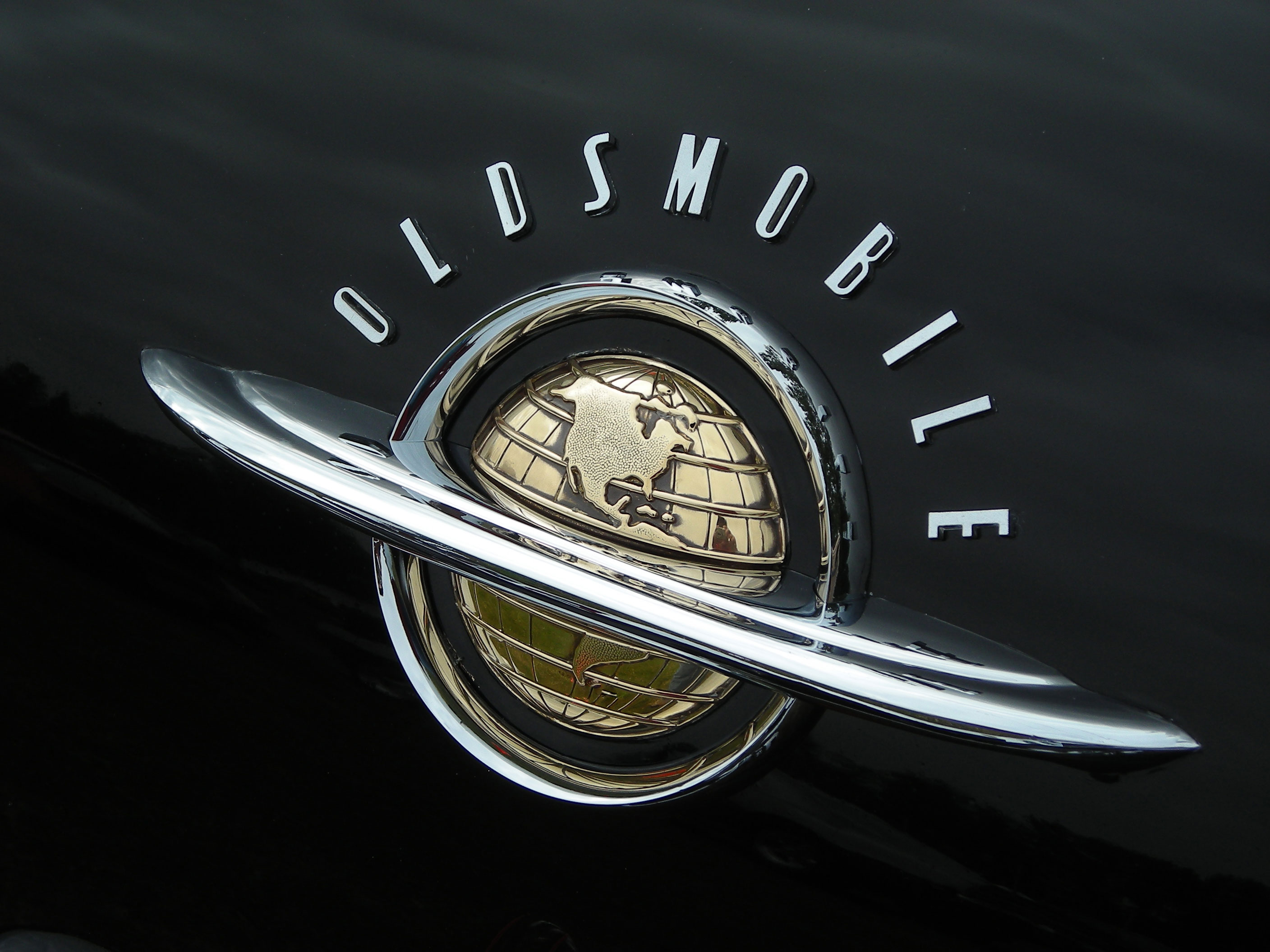 Oldsmobile логотип